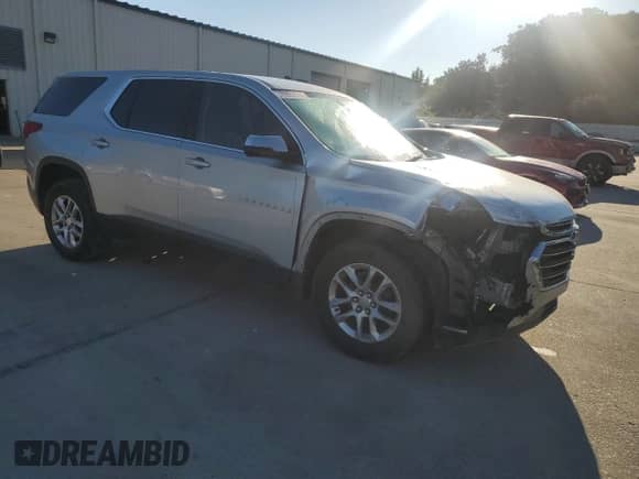 2019 Chevrolet Traverse LS with VIN 1GNERFKW3KJ144131, listed as a Copart auction lot 70937015 with 71,755 mi miles and Salvage title. Bid and sale history available at DreamBid. Image 4.