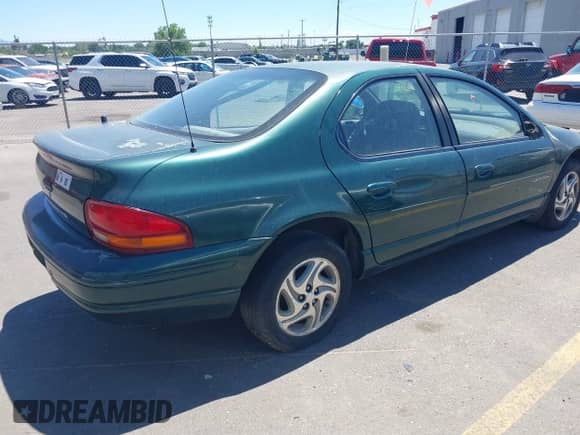 1998 Dodge Stratus ES with VIN 1B3EJ56H2WN224039, listed as a IAAI auction lot 37945746 with 156,754 mi miles and . Bid and sale history available at DreamBid. Image 4.