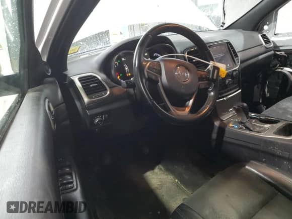 2019 Jeep Grand Cherokee Altitude with VIN 1C4RJFAGXKC678940, listed as a Copart auction lot 81268205 with 102,849 mi miles and Salvage title. Bid and sale history available at DreamBid. Image 8.