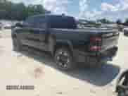 2023 Ram 1500 Rebel with VIN 1C6SRFLT4PN554816, listed as a Copart auction lot 66319915 with 96,984 mi miles and Salvage title. Bid and sale history available at DreamBid. Image 2.