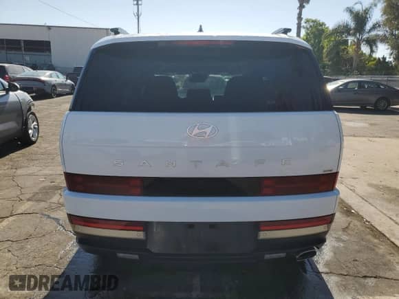 2024 Hyundai Santa Fe Limited z VIN 5NMP4DGL4RH015558, wystawiony jako Copart lot #67055765 z przebiegiem 30 108 mil mil oraz Nie do naprawy • Non repairable. Historia ofert i sprzedaży dostępna na DreamBid. Obrazek 6.