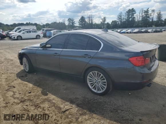 2013 BMW 3 Series 328i xDrive with VIN WBA3B3C54DF536773, listed as a Copart auction lot 70318905 with Not provided miles and Salvage title. Bid and sale history available at DreamBid. Image 2.