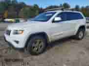 2016 Jeep Grand Cherokee Laredo with VIN 1C4RJFAG8GC324275, listed as a Copart auction lot 89869575 with 149,942 mi miles and Clean title. Bid and sale history available at DreamBid. Image 1.