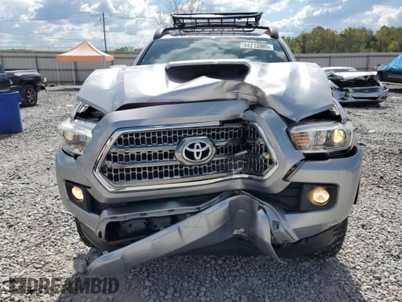 2017 Toyota Tacoma TRD Sport with VIN 5TFAZ5CN5HX030287, listed as a Copart auction lot 84213985 with 112,672 mi miles and Salvage title. Bid and sale history available at DreamBid. Image 5.