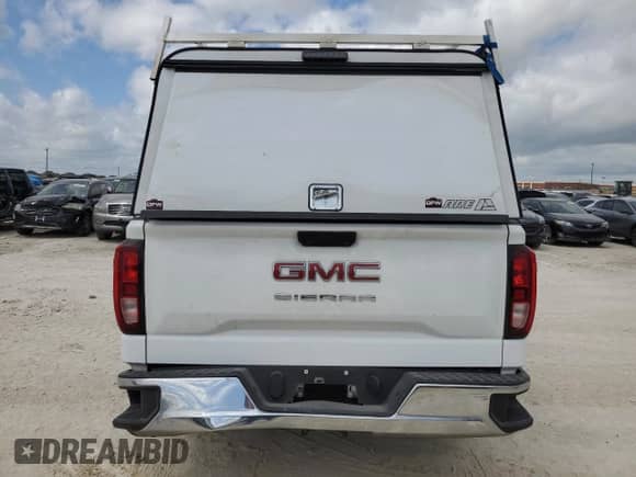 2023 GMC Sierra 1500 Pro with VIN 3GTNHAEK4PG333922, listed as a Copart auction lot 58508154 with 29,803 mi miles and Salvage title. Bid and sale history available at DreamBid. Image 6.