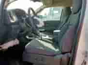 2024 Nissan Frontier SV with VIN 1N6ED1EJ3RN634398, listed as a Copart auction lot 67747525 with 8,906 mi miles and Salvage title. Bid and sale history available at DreamBid. Image 7.