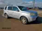 2011 Honda Pilot Touring z VIN 5FNYF3H97BB017646, wystawiony jako Copart lot #70779255 z przebiegiem 219 787 mil mil oraz Czysty tytuł • Clean title. Historia ofert i sprzedaży dostępna na DreamBid. Obrazek 4.