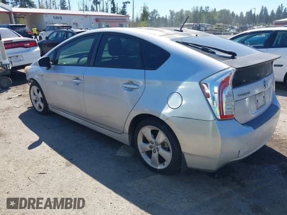 2012 Toyota Prius One with VIN JTDKN3DU2C1487855, listed as a IAAI auction lot 42849320 with 92,099 mi miles and . Bid and sale history available at DreamBid. Image 3.