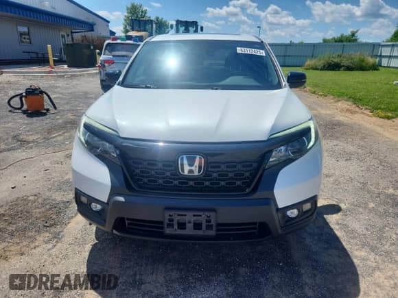 2019 Honda Passport EX-L with VIN 5FNYF8H55KB024525, listed as a Copart auction lot 63112425 with 87,126 mi miles and Salvage title. Bid and sale history available at DreamBid. Image 5.