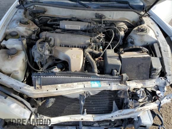 1992 Toyota Camry LE с VIN 4T1SK12E0NU064956, выставлен на аукционе Copart как лот 50665925 с пробегом 228 909 миль миль и Списание • Salvage title. История ставок и продаж доступна на DreamBid. Изображение 13.