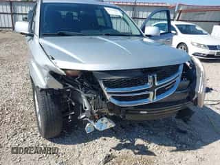 2014 Dodge Journey SXT with VIN 3C4PDCBB3ET112742, listed as a IAAI auction lot 43420445 with 113,538 mi miles and . Bid and sale history available at DreamBid. Image 6.