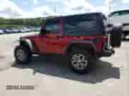 2013 Jeep Wrangler Rubicon 10th Anniversary with VIN 1C4BJWCG6DL508396, listed as a Copart auction lot 61451255 with 125,138 mi miles and Salvage title. Bid and sale history available at DreamBid. Image 2.