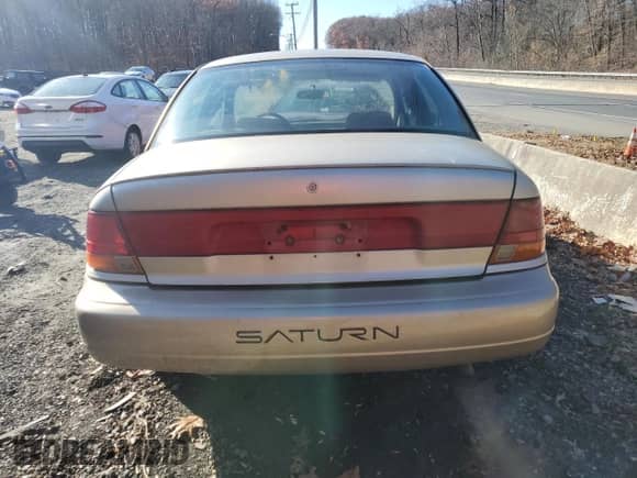 1998 Saturn SL с VIN 1G8ZK5275WZ210570, выставлен на аукционе Copart как лот 82993114 с пробегом 144 690 миль миль и Списание • Salvage title. История ставок и продаж доступна на DreamBid. Изображение 6.