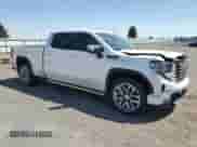 2023 GMC Sierra 1500 Denali with VIN 3GTUUGE84PG273476, listed as a Copart auction lot 65218095 with 39,491 mi miles and Salvage title. Bid and sale history available at DreamBid. Image 4.