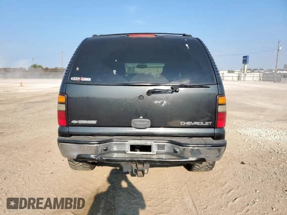 2004 Chevrolet Tahoe LT z VIN 1GNEC13Z44R313185, wystawiony jako Copart lot #81281225 z przebiegiem 231 798 mil mil oraz Szkoda całkowita • Salvage title. Historia ofert i sprzedaży dostępna na DreamBid. Obrazek 6.
