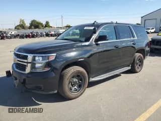 2018 Chevrolet Tahoe Commercial with VIN 1GNSKDEC6JR212452, listed as a Copart auction lot 85390375 with 89,839 mi miles and Clean title. Bid and sale history available at DreamBid. Image 1.
