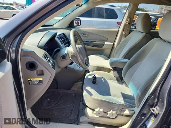 2007 Hyundai Tucson SE with VIN KM8JN12D07U665412, listed as a Copart auction lot 80113605 with 201,956 mi miles and Salvage title. Bid and sale history available at DreamBid. Image 7.