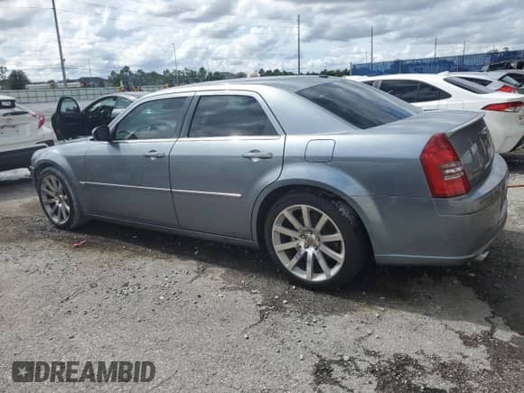 2006 Chrysler 300 C SRT-8 with VIN 2C3LA73W16H423780, listed as a Copart auction lot 56702105 with 93,826 mi miles and Salvage title. Bid and sale history available at DreamBid. Image 2.