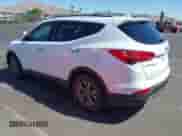 2016 Hyundai Santa Fe with VIN 5XYZU3LBXGG316388, listed as a IAAI auction lot 43215922 with 123,510 mi miles and . Bid and sale history available at DreamBid. Image 3.