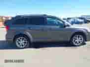2014 Dodge Journey SXT with VIN 3C4PDDBG8ET214636, listed as a IAAI auction lot 41651140 with 141,742 mi miles and . Bid and sale history available at DreamBid. Image 13.