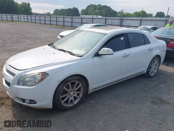 2012 Chevrolet Malibu LTZ z VIN 1G1ZG5E72CF145136, wystawiony jako IAAI lot #42421702 z przebiegiem 190 138 mil mil oraz . Historia ofert i sprzedaży dostępna na DreamBid. Obrazek 2.