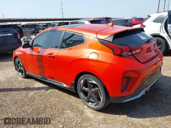 2019 Hyundai Veloster Turbo R-Spec z VIN KMHTH6AB2KU010979, wystawiony jako IAAI lot #41955901 z przebiegiem 98 581 mil mil oraz . Historia ofert i sprzedaży dostępna na DreamBid. Obrazek 3.