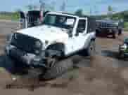 2015 Jeep Wrangler Sport with VIN 1C4AJWAG9FL747006, listed as a IAAI auction lot 42303813 with 110,194 mi miles and . Bid and sale history available at DreamBid. Image 2.
