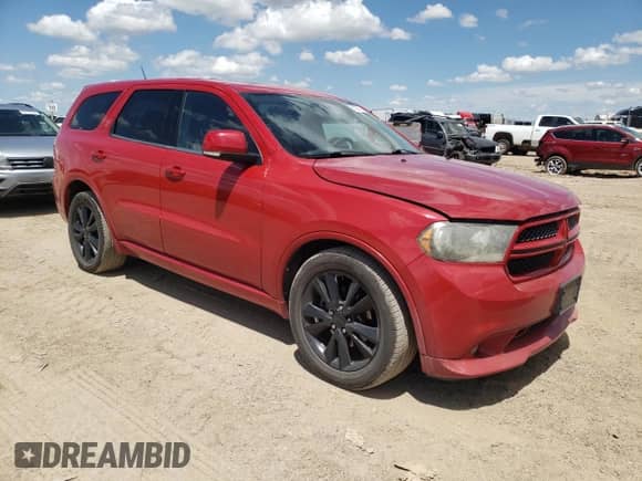 2012 Dodge Durango R/T with VIN 1C4SDHCT8CC130015, listed as a Copart auction lot 62122114 with 131,544 mi miles and Salvage title. Bid and sale history available at DreamBid. Image 4.