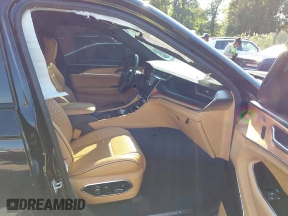 2023 Jeep Grand Cherokee Summit with VIN 1C4RJHEGXPC543650, listed as a IAAI auction lot 43204572 with 50,036 mi miles and . Bid and sale history available at DreamBid. Image 5.