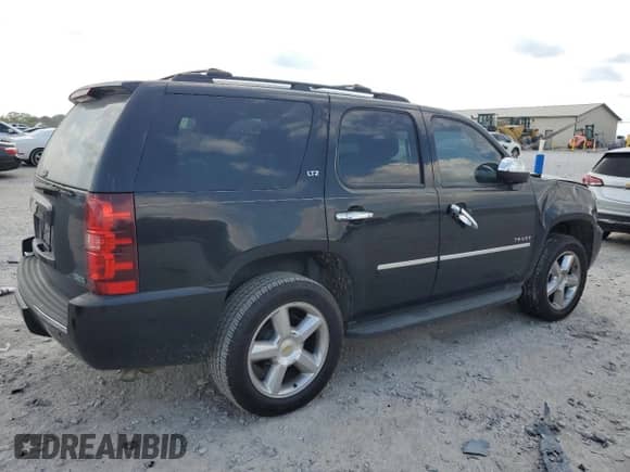 2010 Chevrolet Tahoe LTZ с VIN 1GNUKCE0XAR287678, выставлен на аукционе Copart как лот 80432845 с пробегом 207 563 миль миль и Списание • Salvage title. История ставок и продаж доступна на DreamBid. Изображение 3.