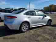 2021 Toyota Corolla LE with VIN 5YFEPMAE2MP204295, listed as a Copart auction lot 87250225 with 112,477 mi miles and Clean title. Bid and sale history available at DreamBid. Image 3.