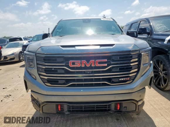 2023 GMC Sierra 1500 AT4 with VIN 1GTUUEE85PZ186223, listed as a Copart auction lot 59154585 with 32,727 mi miles and Salvage title. Bid and sale history available at DreamBid. Image 5.