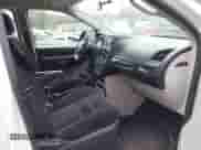 2014 Dodge Grand Caravan SE with VIN 2C4RDGBG6ER458881, listed as a IAAI auction lot 43574110 with 189,082 mi miles and . Bid and sale history available at DreamBid. Image 5.