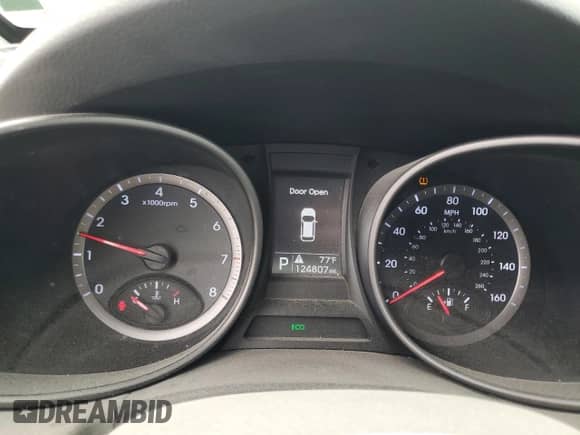 2013 Hyundai Santa Fe Sport z VIN 5XYZU3LBXDG114775, wystawiony jako Copart lot #58007985 z przebiegiem 124 807 mil mil oraz Szkoda całkowita • Salvage title. Historia ofert i sprzedaży dostępna na DreamBid. Obrazek 9.