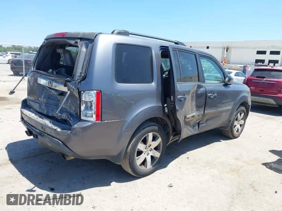 2014 Honda Pilot Touring with VIN 5FNYF3H98EB003274, listed as a IAAI auction lot 42815552 with 223,025 mi miles and . Bid and sale history available at DreamBid. Image 4.