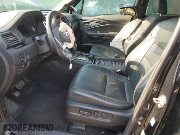2019 Honda Passport Elite with VIN 5FNYF8H08KB000384, listed as a Copart auction lot 66898195 with 65,105 mi miles and Salvage title. Bid and sale history available at DreamBid. Image 7.