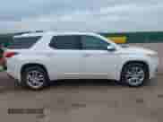 2021 Chevrolet Traverse High Country z VIN 1GNEVNKW6MJ136436, wystawiony jako IAAI lot #42879320 z przebiegiem 71 677 mil mil oraz . Historia ofert i sprzedaży dostępna na DreamBid. Obrazek 13.