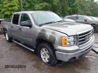 2013 GMC Sierra 1500 SLE z VIN 3GTP2VE7XDG333982, wystawiony jako IAAI lot #42348055 z przebiegiem Nie podano mil oraz . Historia ofert i sprzedaży dostępna na DreamBid. Obrazek 1.