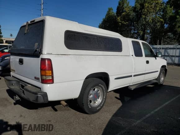 2002 GMC Sierra 1500 SLE1 z VIN 1GTEC19TX2E216332, wystawiony jako Copart lot #71175735 z przebiegiem Nie podano mil oraz Szkoda całkowita • Salvage title. Historia ofert i sprzedaży dostępna na DreamBid. Obrazek 3.