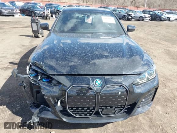 2024 BMW i4 xDrive40 с VIN WBY83FB04RFT19615, выставлен на аукционе IAAI как лот 41679918 с пробегом 3 883 миль миль и . История ставок и продаж доступна на DreamBid. Изображение 21.