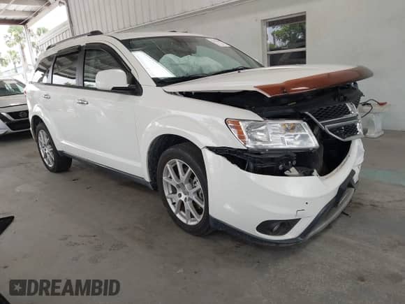 2012 Dodge Journey Crew with VIN 3C4PDCDG4CT392046, listed as a IAAI auction lot 42474542 with 112,128 mi miles and . Bid and sale history available at DreamBid. Image 1.