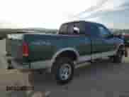 2000 Ford F-150 XL with VIN 1FTRX18W6YNC36359, listed as a Copart auction lot 54460215 with 288,806 mi miles and Salvage title. Bid and sale history available at DreamBid. Image 3.