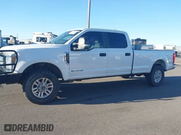 2019 Ford F-250 XL with VIN 1FT7W2BT2KED84563, listed as a IAAI auction lot 43230876 with 227,742 mi miles and . Bid and sale history available at DreamBid. Image 14.