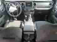 2023 Jeep Wrangler Sahara Altitude with VIN 1C4HJXEG1PW600466, listed as a Copart auction lot 80017505 with 21,912 mi miles and Salvage title. Bid and sale history available at DreamBid. Image 8.