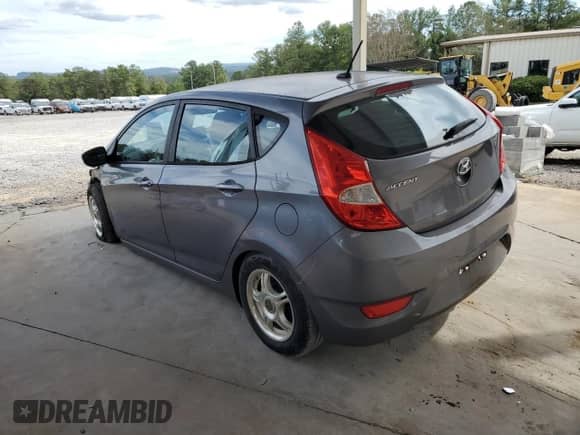 2015 Hyundai Accent GS z VIN KMHCT5AE4FU231752, wystawiony jako Copart lot #81463195 z przebiegiem 109 312 mil mil oraz Szkoda całkowita • Salvage title. Historia ofert i sprzedaży dostępna na DreamBid. Obrazek 2.