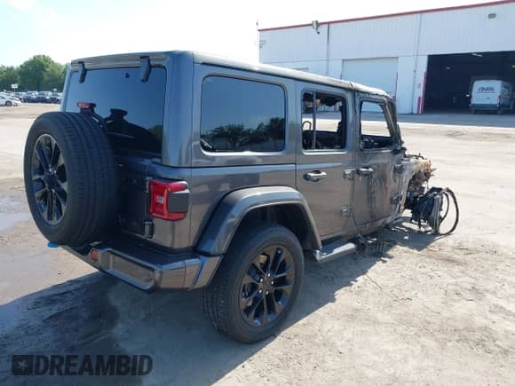 2021 Jeep Wrangler Unlimited Sahara z VIN 1C4JJXP60MW643293, wystawiony jako IAAI lot #42276393 z przebiegiem Nie podano mil oraz . Historia ofert i sprzedaży dostępna na DreamBid. Obrazek 4.