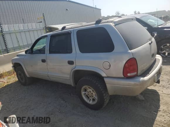 1998 Dodge Durango with VIN 1B4HS28Y9WF200199, listed as a Copart auction lot 69267714 with 272,523 mi miles and Salvage title. Bid and sale history available at DreamBid. Image 2.