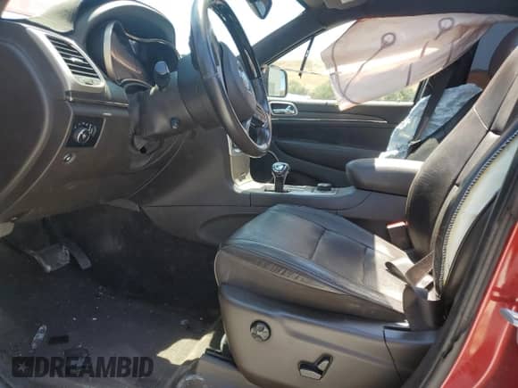 2014 Jeep Grand Cherokee Summit with VIN 1C4RJFJT2EC159852, listed as a Copart auction lot 64775585 with 99,905 mi miles and Salvage title. Bid and sale history available at DreamBid. Image 7.