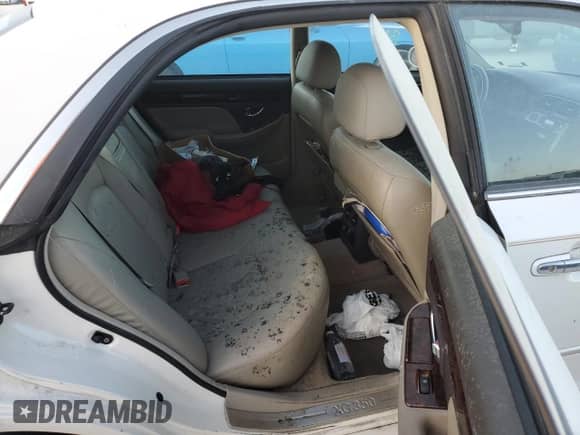 2003 Hyundai XG с VIN KMHFU45E63A237404, выставлен на аукционе Copart как лот 77546824 с пробегом Не указан миль и На запчасти • Non repairable. История ставок и продаж доступна на DreamBid. Изображение 10.