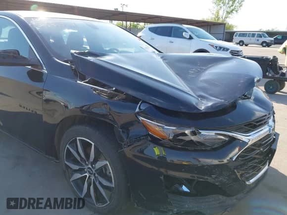 2021 Chevrolet Malibu RS with VIN 1G1ZG5STXMF029850, listed as a IAAI auction lot 42029121 with 56,384 mi miles and . Bid and sale history available at DreamBid. Image 18.